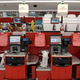 A line of Target self-checkout kiosks with no candy or snacks nearby